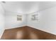 This bedroom has a light and airy feel, thanks to the two windows letting in tons of light at 1051 Pert Ln, Holiday, FL 34691