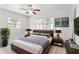 Serene bedroom with ample natural light, plush bedding, and stylish decor at 109 Emerald Ln, Largo, FL 33771
