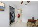 Comfortable bedroom featuring closet storage with a view of a second room at 109 Emerald Ln, Largo, FL 33771