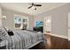 Bright bedroom with natural light, dark wood floors, and modern furnishings at 111 E Jean St, Tampa, FL 33604