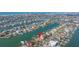 An aerial view of the property in a waterfront community, marked with a red pin for easy identification at 11160 8Th E St, Treasure Island, FL 33706