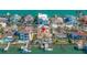 This aerial view showcases the waterfront home with dock, pool, and close proximity to the ocean at 11160 8Th E St, Treasure Island, FL 33706