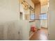 Bathroom with wood-paneled ceiling and decorative screen at 11160 8Th E St, Treasure Island, FL 33706