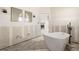 A bathroom featuring a stand alone tub at 11160 8Th E St, Treasure Island, FL 33706