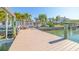 Spacious boat dock with bench seating, perfect for relaxing and enjoying the waterfront views at 11160 8Th E St, Treasure Island, FL 33706
