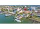 Waterfront home featuring a private dock, boat, pool, with stunning bay views at 11160 8Th E St, Treasure Island, FL 33706