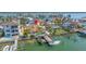 Waterfront home with private dock, lush landscaping, pool, and easy access to the bay at 11160 8Th E St, Treasure Island, FL 33706