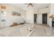 View of a living room featuring a sliding door, fireplace, and a water view at 11160 8Th E St, Treasure Island, FL 33706