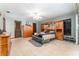 Spacious bedroom featuring tiled floors, a ceiling fan, and lots of wood cabinetry at 11307 Sandpine Rd, Riverview, FL 33569