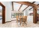 Cozy breakfast nook with large window and wood table at 11307 Sandpine Rd, Riverview, FL 33569