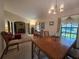 Open-concept dining area with seamless flow to the living room at 11307 Sandpine Rd, Riverview, FL 33569