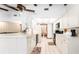 Bright kitchen featuring white cabinetry, updated appliances, and open design at 11307 Sandpine Rd, Riverview, FL 33569
