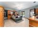 Main bedroom with tile flooring, sliding glass doors and spacious layout at 11307 Sandpine Rd, Riverview, FL 33569