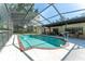Beautiful screened-in pool with spacious patio, offering a private and relaxing outdoor retreat at 11307 Sandpine Rd, Riverview, FL 33569