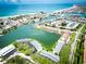 Aerial view of the community with bay access, beach access, and a gorgeous view at 12132 Capri S Cir, Treasure Island, FL 33706