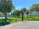 Outdoor basketball court surrounded by trees, great for exercise and community interaction at 12132 Capri S Cir, Treasure Island, FL 33706