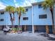 Condo with garage and well-maintained landscaping, offering both convenience and curb appeal at 12132 Capri S Cir, Treasure Island, FL 33706