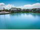 The waterfront condo boasts beautifully maintained landscaping and picturesque canal views at 12132 Capri S Cir, Treasure Island, FL 33706