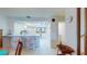 Bright kitchen featuring a breakfast bar, white cabinetry and tile backsplash at 12132 Capri S Cir, Treasure Island, FL 33706
