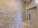Close-up of newly renovated shower with a bench and built-in storage niche at 12132 Capri S Cir, Treasure Island, FL 33706