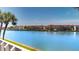 Wide view of the community waterway and neighboring condominiums on a bright, sunny day at 12132 Capri S Cir, Treasure Island, FL 33706
