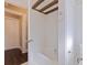 Modern bathroom featuring a tub with white subway tile and exposed beam ceiling at 1225 22Nd S Ave, St Petersburg, FL 33705