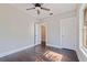 Bright bedroom with a ceiling fan, hardwood floors and natural light at 1225 22Nd S Ave, St Petersburg, FL 33705