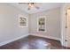 Bedroom features include hardwood floors, two windows, ceiling fan, and a closet at 1225 22Nd S Ave, St Petersburg, FL 33705