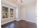 Bedroom with hardwood floors, a ceiling fan, a large window and a closet at 1225 22Nd S Ave, St Petersburg, FL 33705