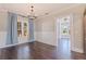 Inviting dining room with a decorative light fixture and windows providing natural light at 1225 22Nd S Ave, St Petersburg, FL 33705