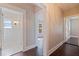 Hallway with doors leading to the bathroom and an additional room at 1225 22Nd S Ave, St Petersburg, FL 33705