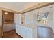 Bright, open kitchen features a stylish island, exposed brick accents, and stainless steel appliances at 1225 22Nd S Ave, St Petersburg, FL 33705