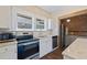 Bright kitchen features stainless steel appliances, sleek cabinetry, and a modern design at 1225 22Nd S Ave, St Petersburg, FL 33705