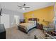 Bedroom featuring an accent wall, carpet flooring, natural light, and closet at 13301 Waterleaf Garden Cir, Riverview, FL 33579