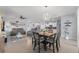 Bright living space with a dining area, modern lighting, and comfortable seating provides a great atmosphere at 13301 Waterleaf Garden Cir, Riverview, FL 33579