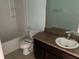 Well-maintained bathroom with modern vanity, ceramic tile flooring, and a pristine shower-tub combination at 15733 Stable Run Dr, Spring Hill, FL 34610