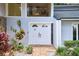 Inviting front entrance with double doors and manicured landscaping at 15917 Dover Cliffe Dr, Lutz, FL 33548