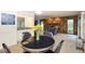 Inviting dining and living space features a stone fireplace and ample natural light at 15917 Dover Cliffe Dr, Lutz, FL 33548