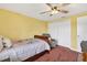 Bedroom with a ceiling fan, chair, and closet at 15925 Marshfield Dr, Tampa, FL 33624