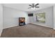 Comfortable bedroom with a ceiling fan and a bright window at 15925 Marshfield Dr, Tampa, FL 33624