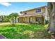 Attractive home featuring a well-maintained lawn, lovely landscaping, and an inviting entrance at 15925 Marshfield Dr, Tampa, FL 33624