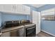 Well-equipped laundry room with modern washer and dryer at 15925 Marshfield Dr, Tampa, FL 33624