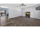 Large living room featuring modern lighting, neutral walls, and updated flooring at 15925 Marshfield Dr, Tampa, FL 33624