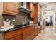 Well-equipped kitchen showcases granite countertops, mosaic backsplash, and stainless steel appliances at 165 Mobbly Bay Dr, Oldsmar, FL 34677