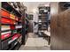 Spacious walk-in closet with custom shelving for clothes, shoes, and accessories at 165 Mobbly Bay Dr, Oldsmar, FL 34677
