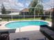 Relax by the pool in your private screened-in lanai and backyard at 1753 Open Field Loop, Brandon, FL 33510