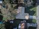 Bird's-eye view of a single-Gathering home featuring a long driveway and large yard at 2063 De Carlo Ave, Spring Hill, FL 34608
