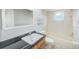 Bathroom with tub and shower, granite countertop and updated fixtures at 2063 De Carlo Ave, Spring Hill, FL 34608