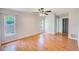 Bedroom with ample natural light, ceiling fan, and neutral paint at 2063 De Carlo Ave, Spring Hill, FL 34608