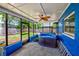 Spacious covered patio with hot tub and ceiling fan perfect for outdoor living and entertaining at 2063 De Carlo Ave, Spring Hill, FL 34608